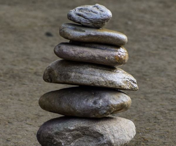 Balanced abstract towers representing personal stability and life harmony